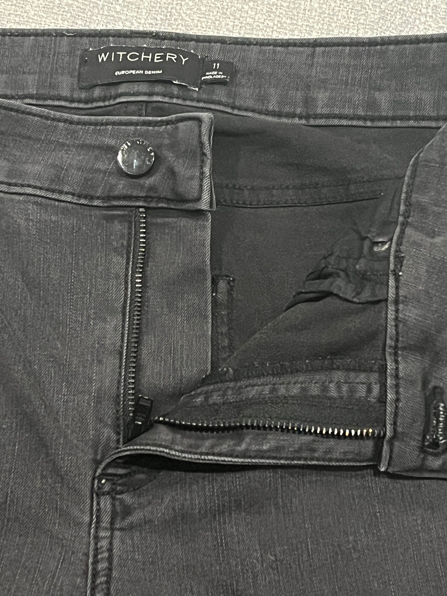Witchery black skinny jeans with split hem - size 11