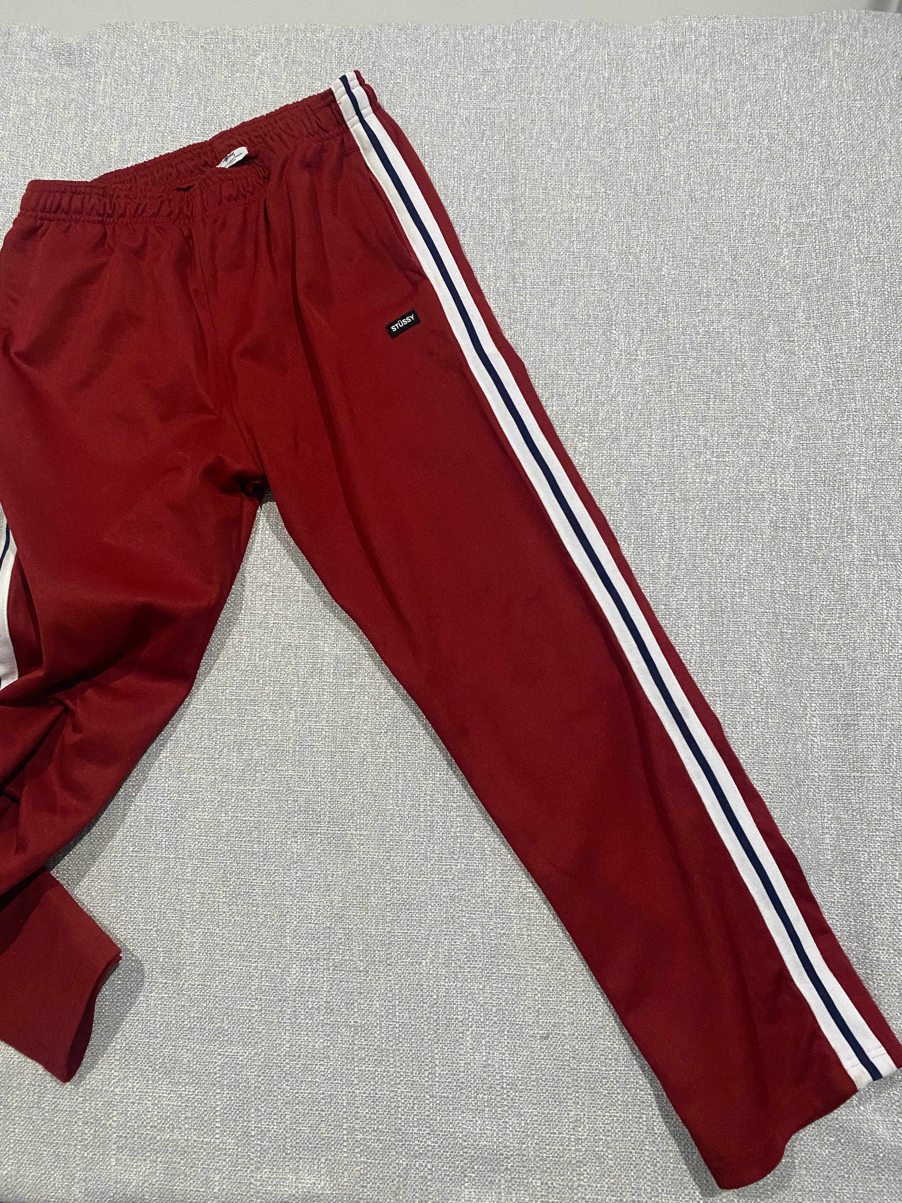 Stüssy Red Track Pants with White and Navy Side Stripes