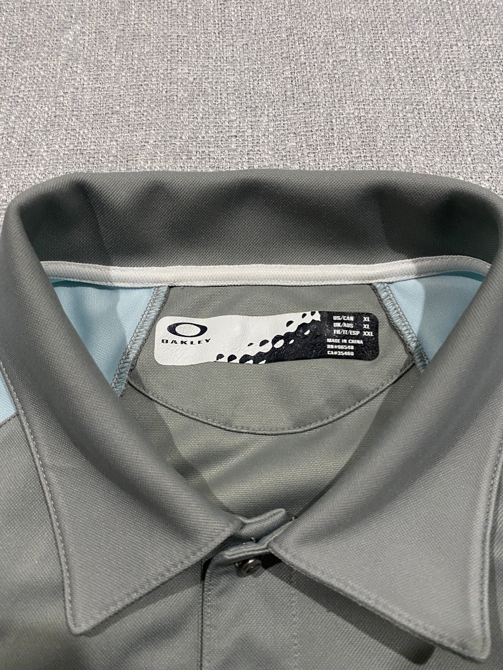 Oakley Men's Polo Shirt in Gray and Light Blue